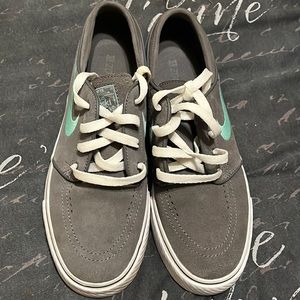 Dark grey/medium mint Nike. Gently worn
